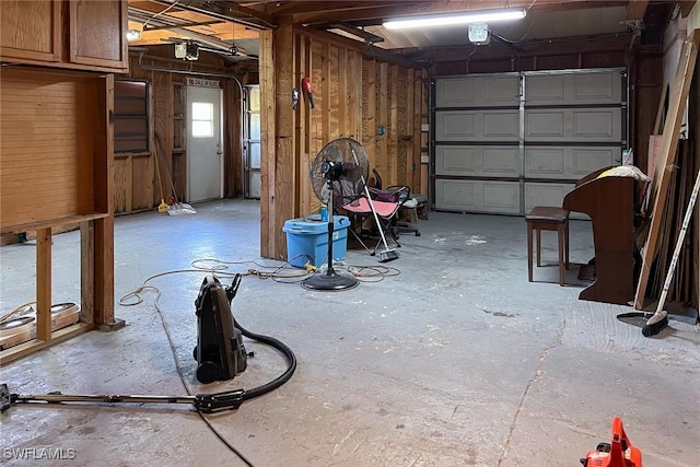 7384 Coon Rd, North Fort Myers, FL 33917 - garage featuring a garage door opener