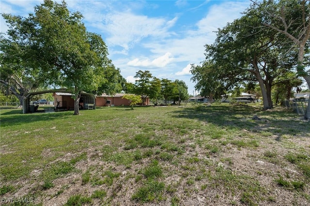 7384 Coon Rd, North Fort Myers, FL 33917 - view of yard featuring a carport