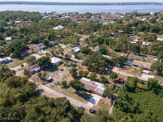 7384 Coon Rd, North Fort Myers, FL 33917 - aerial view of property's location featuring a nearby body of water