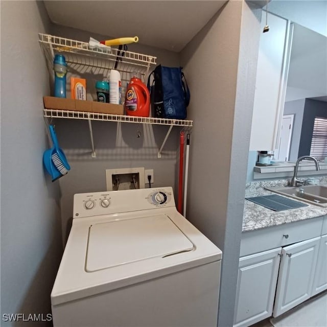 2925 Winkler Ave Unit 906, Fort Myers, FL 33916 - washroom with washer / dryer and cabinet space