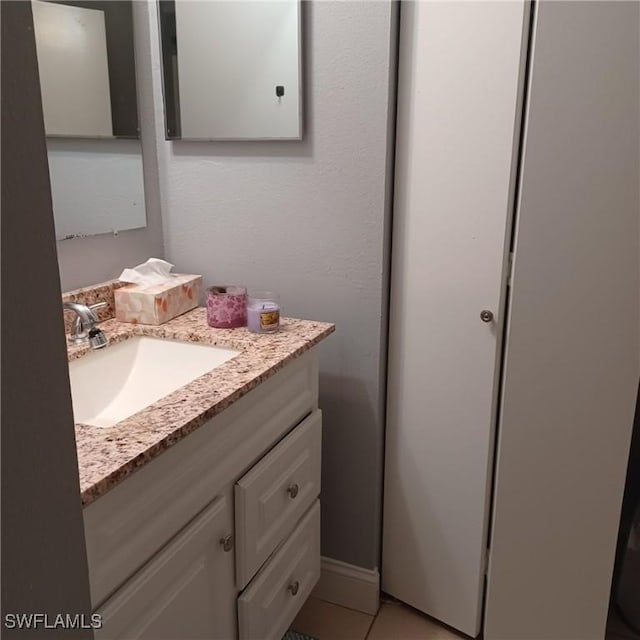 2925 Winkler Ave Unit 906, Fort Myers, FL 33916 - bathroom featuring vanity and tile patterned floors
