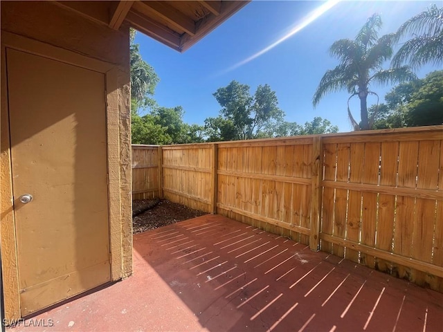 2925 Winkler Ave Unit 906, Fort Myers, FL 33916 - view of patio / terrace with fence