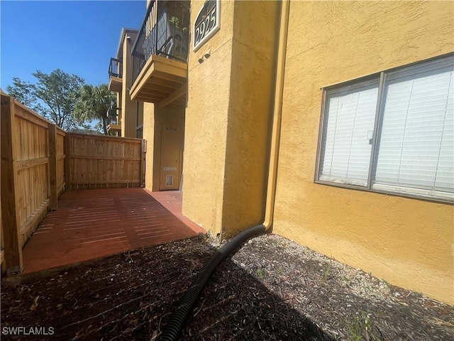 2925 Winkler Ave Unit 906, Fort Myers, FL 33916 - view of patio featuring fence and a balcony