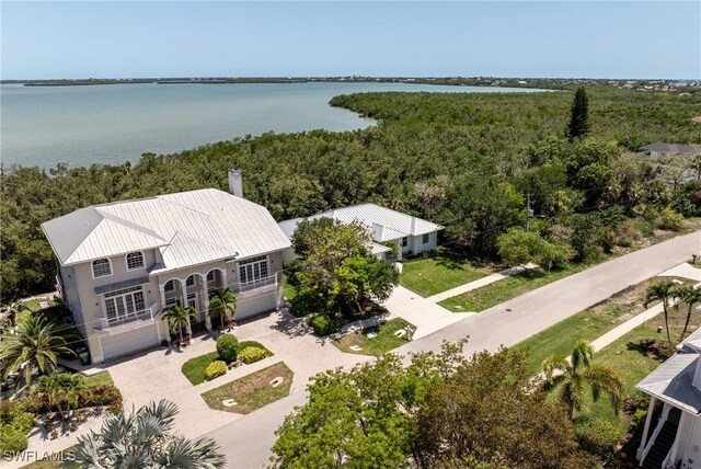 1923 Sheffield Ave, Marco Island, FL 34145 - view of subject property with a nearby body of water and a heavily wooded area