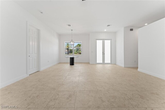 1923 Sheffield Ave, Marco Island, FL 34145 - unfurnished room featuring french doors, recessed lighting, baseboards, and light tile patterned floors
