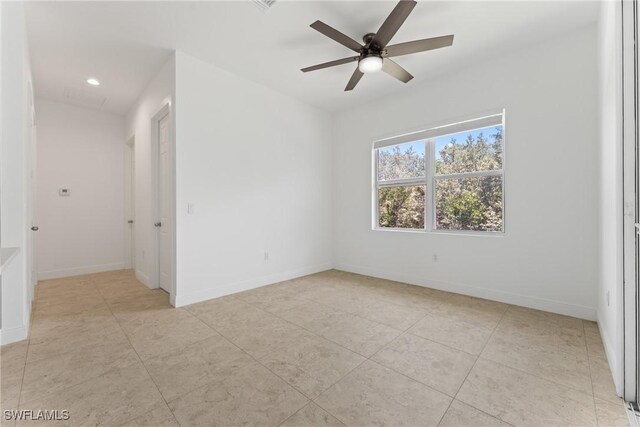 1923 Sheffield Ave, Marco Island, FL 34145 - empty room with a ceiling fan, light tile patterned floors, baseboards, and recessed lighting