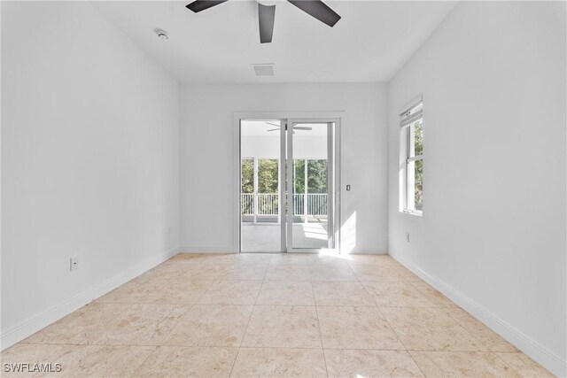 1923 Sheffield Ave, Marco Island, FL 34145 - tiled empty room featuring ceiling fan, baseboards, and a smoke detector