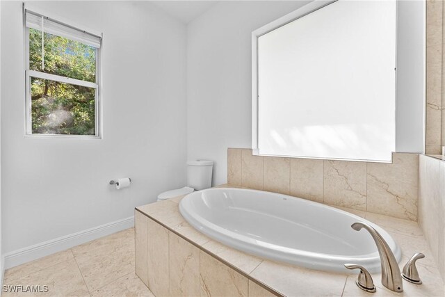 1923 Sheffield Ave, Marco Island, FL 34145 - full bathroom with a garden tub and baseboards