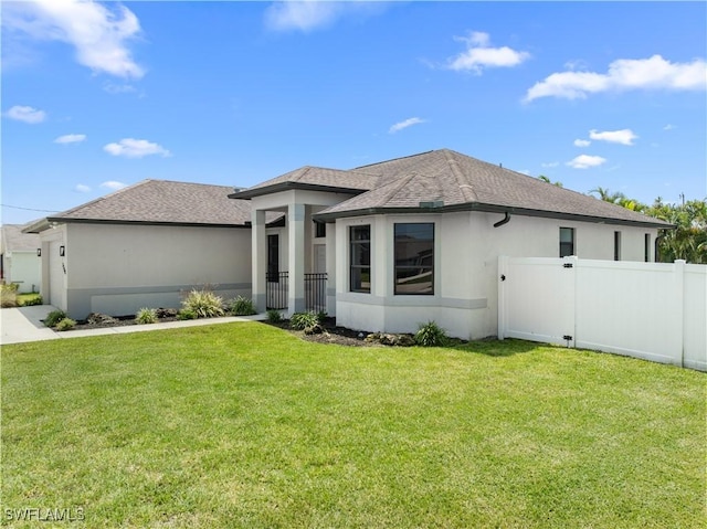 2208 SW 12th Ln, Cape Coral, FL 33991 - prairie-style home featuring stucco siding and roof with shingles