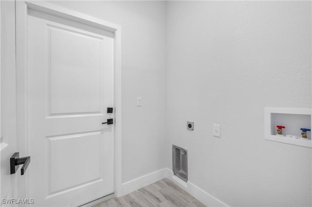 2208 SW 12th Ln, Cape Coral, FL 33991 - laundry room featuring electric dryer hookup, hookup for a washing machine, baseboards, and light wood-type flooring