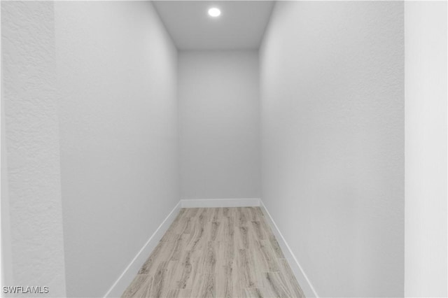2208 SW 12th Ln, Cape Coral, FL 33991 - interior space with light wood-style floors, baseboards, and recessed lighting