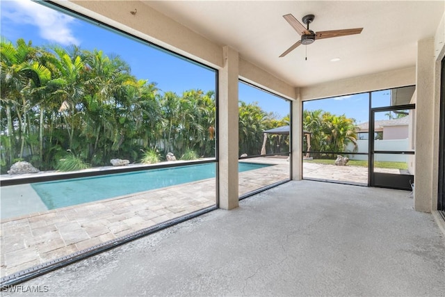 2208 SW 12th Ln, Cape Coral, FL 33991 - outdoor pool with a ceiling fan and a patio area