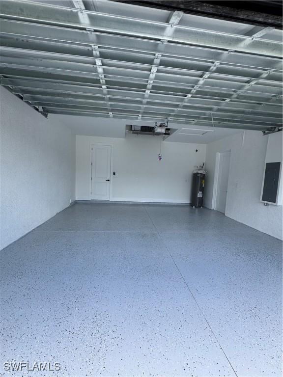 1010 Euclid Ave, Lehigh Acres, FL 33972 - garage with electric water heater and electric panel