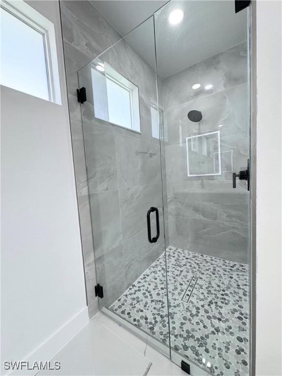1010 Euclid Ave, Lehigh Acres, FL 33972 - full bathroom featuring a shower stall and recessed lighting