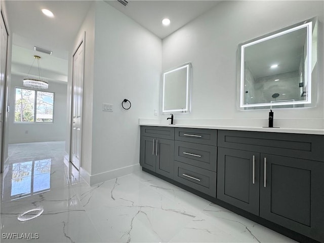 1010 Euclid Ave, Lehigh Acres, FL 33972 - bathroom with baseboards, double vanity, marble finish flooring, recessed lighting, and a shower