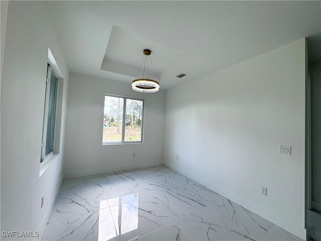 1010 Euclid Ave, Lehigh Acres, FL 33972 - unfurnished room featuring marble finish flooring and baseboards
