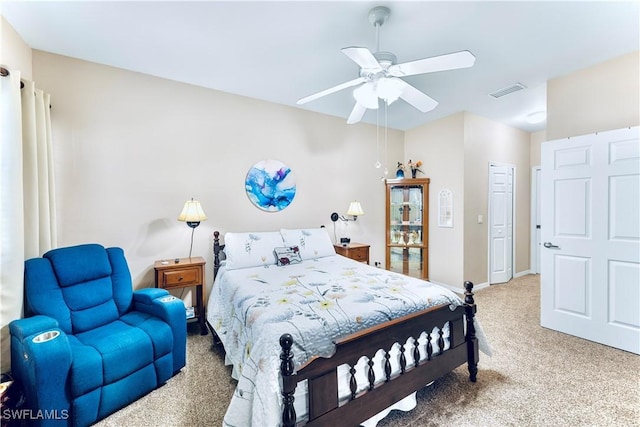 19977 Lake Vista Cir Unit 17A, Lehigh Acres, FL 33936 - carpeted bedroom with ceiling fan and baseboards