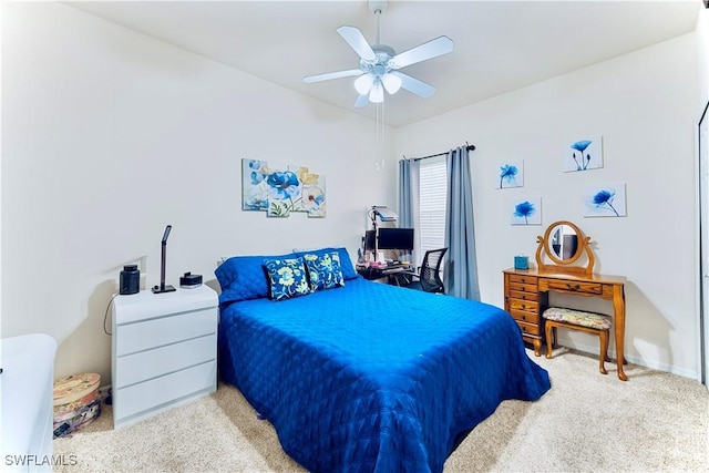 19977 Lake Vista Cir Unit 17A, Lehigh Acres, FL 33936 - carpeted bedroom featuring ceiling fan