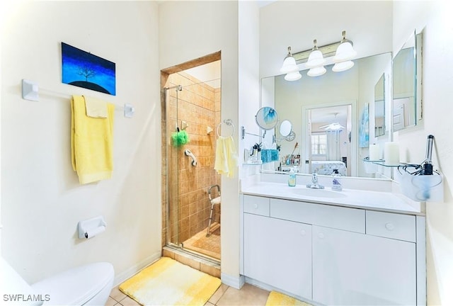 19977 Lake Vista Cir Unit 17A, Lehigh Acres, FL 33936 - ensuite bathroom with tile patterned floors, a shower stall, toilet, and vanity