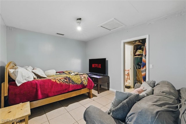 573 Pachman Cir, Lehigh Acres, FL 33974 - bedroom with attic access and tile patterned floors