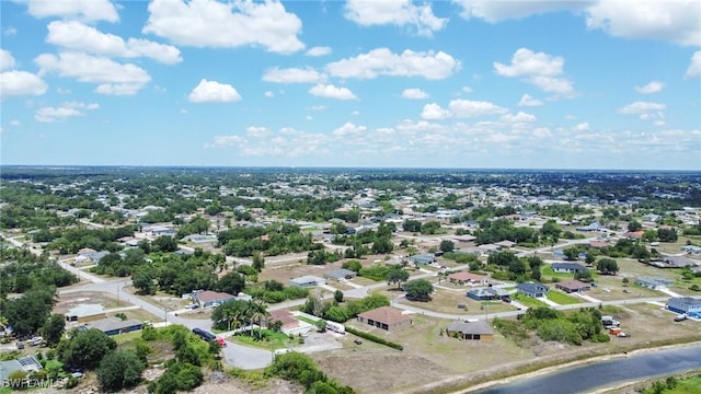 573 Pachman Cir, Lehigh Acres, FL 33974 - aerial perspective of suburban area