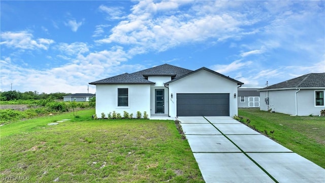 7071 Tide Cir, Labelle, FL 33935 - single story home with a garage, driveway, a front yard, and stucco siding