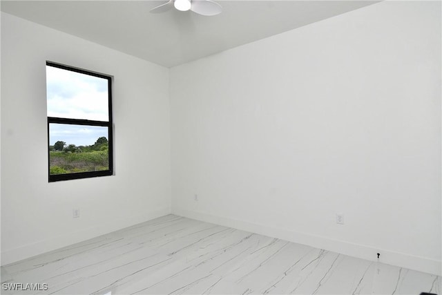 7071 Tide Cir, Labelle, FL 33935 - spare room featuring a ceiling fan, baseboards, and light marble finish floors