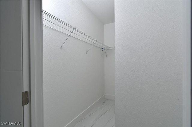 7071 Tide Cir, Labelle, FL 33935 - spacious closet featuring marble finish flooring