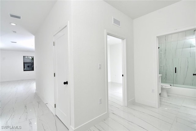 6010 Acorn Cir, Labelle, FL 33935 - corridor featuring marble finish floors, baseboards, and recessed lighting