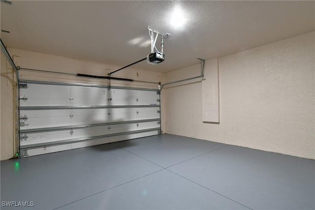 6010 Acorn Cir, Labelle, FL 33935 - garage featuring a garage door opener