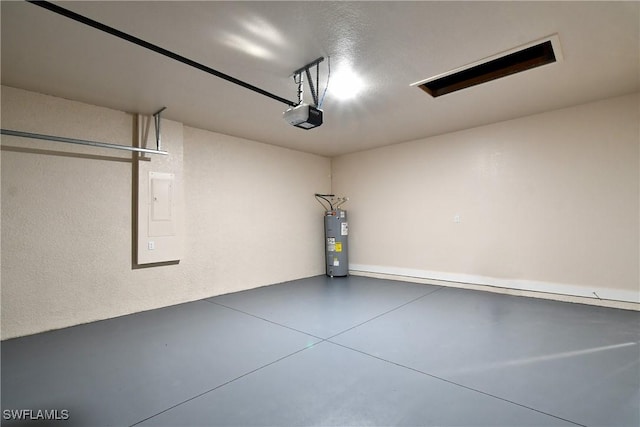 6010 Acorn Cir, Labelle, FL 33935 - garage with water heater and a garage door opener