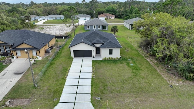 6010 Acorn Cir, Labelle, FL 33935 - aerial view of property and surrounding area with a heavily wooded area