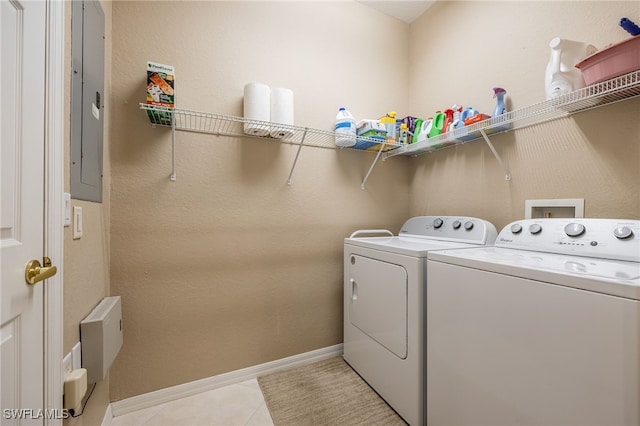 14746 Calusa Palms Dr Unit 102, Fort Myers, FL 33919 - laundry area featuring separate washer and dryer, electric panel, baseboards, and light tile patterned floors