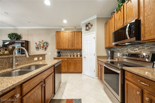 14746 Calusa Palms Dr Unit 102, Fort Myers, FL 33919 - kitchen featuring stainless steel appliances, backsplash, a sink, crown molding, and light tile patterned flooring