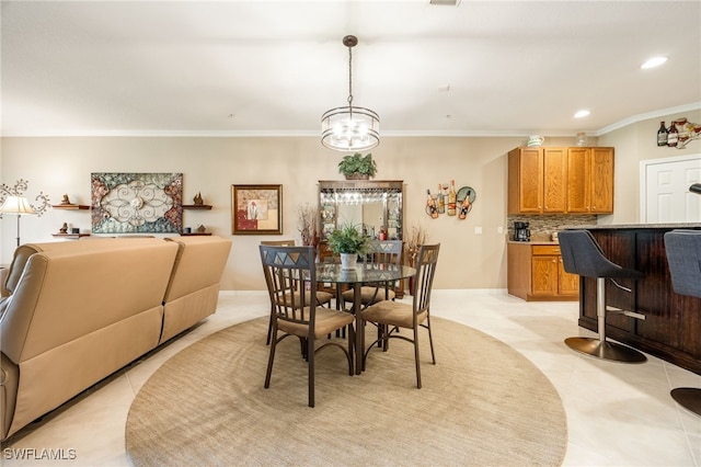 14746 Calusa Palms Dr Unit 102, Fort Myers, FL 33919 - dining area featuring recessed lighting, crown molding, and a chandelier