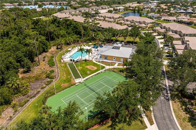 14746 Calusa Palms Dr Unit 102, Fort Myers, FL 33919 - aerial perspective of suburban area with a pool and a nearby body of water