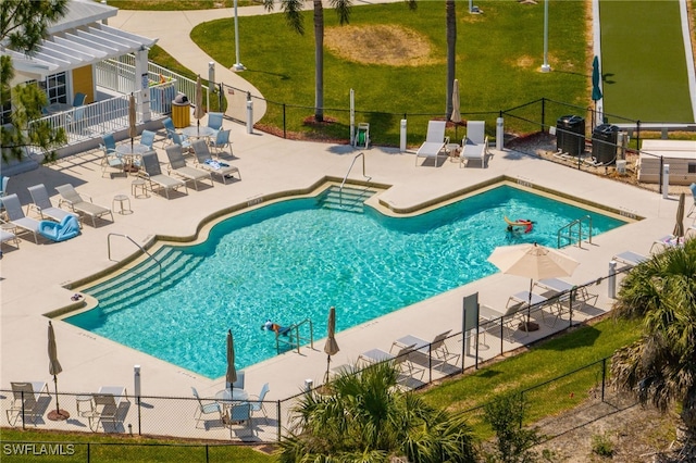 14746 Calusa Palms Dr Unit 102, Fort Myers, FL 33919 - community pool with fence, a pergola, and a patio