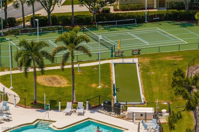 14746 Calusa Palms Dr Unit 102, Fort Myers, FL 33919 - community pool featuring fence and a tennis court