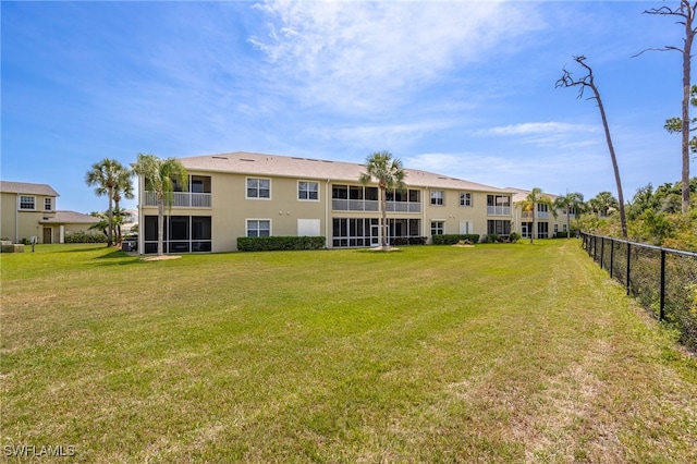 14746 Calusa Palms Dr Unit 102, Fort Myers, FL 33919 - back of house with stucco siding and a balcony