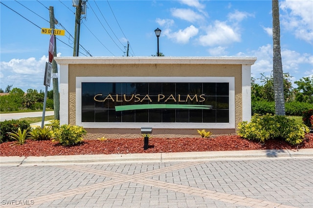 14746 Calusa Palms Dr Unit 102, Fort Myers, FL 33919 - view of community sign