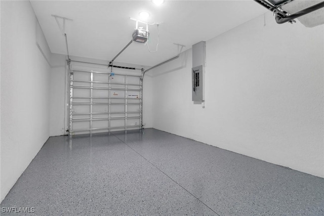 761 Fleming Ave S, Lehigh Acres, FL 33974 - garage with a garage door opener and electric panel