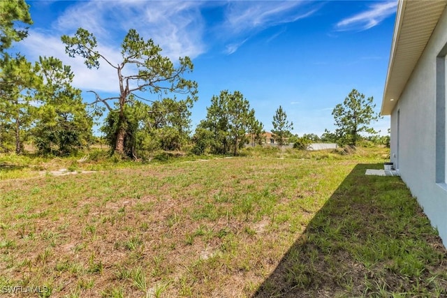 761 Fleming Ave S, Lehigh Acres, FL 33974 - view of grassy yard