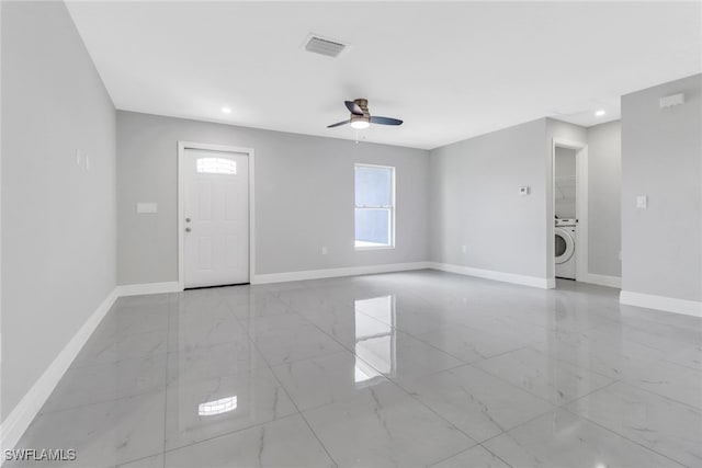 761 Fleming Ave S, Lehigh Acres, FL 33974 - empty room with light marble finish flooring, washer / dryer, baseboards, a ceiling fan, and recessed lighting