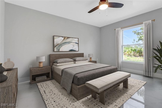 761 Fleming Ave S, Lehigh Acres, FL 33974 - bedroom with baseboards and a ceiling fan