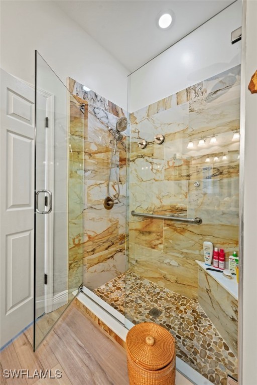 10016 Majestic Ave, Fort Myers, FL 33913 - bathroom with a marble finish shower