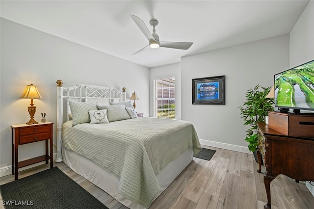 10016 Majestic Ave, Fort Myers, FL 33913 - bedroom featuring light wood-style floors, baseboards, and a ceiling fan