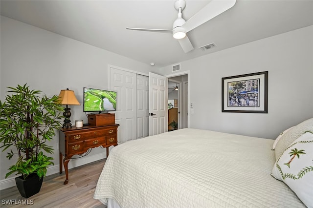 10016 Majestic Ave, Fort Myers, FL 33913 - bedroom with light wood finished floors, a closet, a ceiling fan, and baseboards