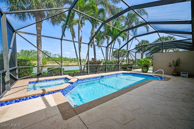 10016 Majestic Ave, Fort Myers, FL 33913 - view of swimming pool featuring a patio area, a water view, a pool with connected hot tub, and a lanai