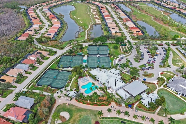 10016 Majestic Ave, Fort Myers, FL 33913 - aerial view of property and surrounding area featuring a large body of water, a local golf course, a pool, and nearby suburban area