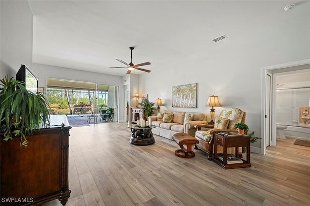 10016 Majestic Ave, Fort Myers, FL 33913 - living room featuring ceiling fan, wood finished floors, and baseboards